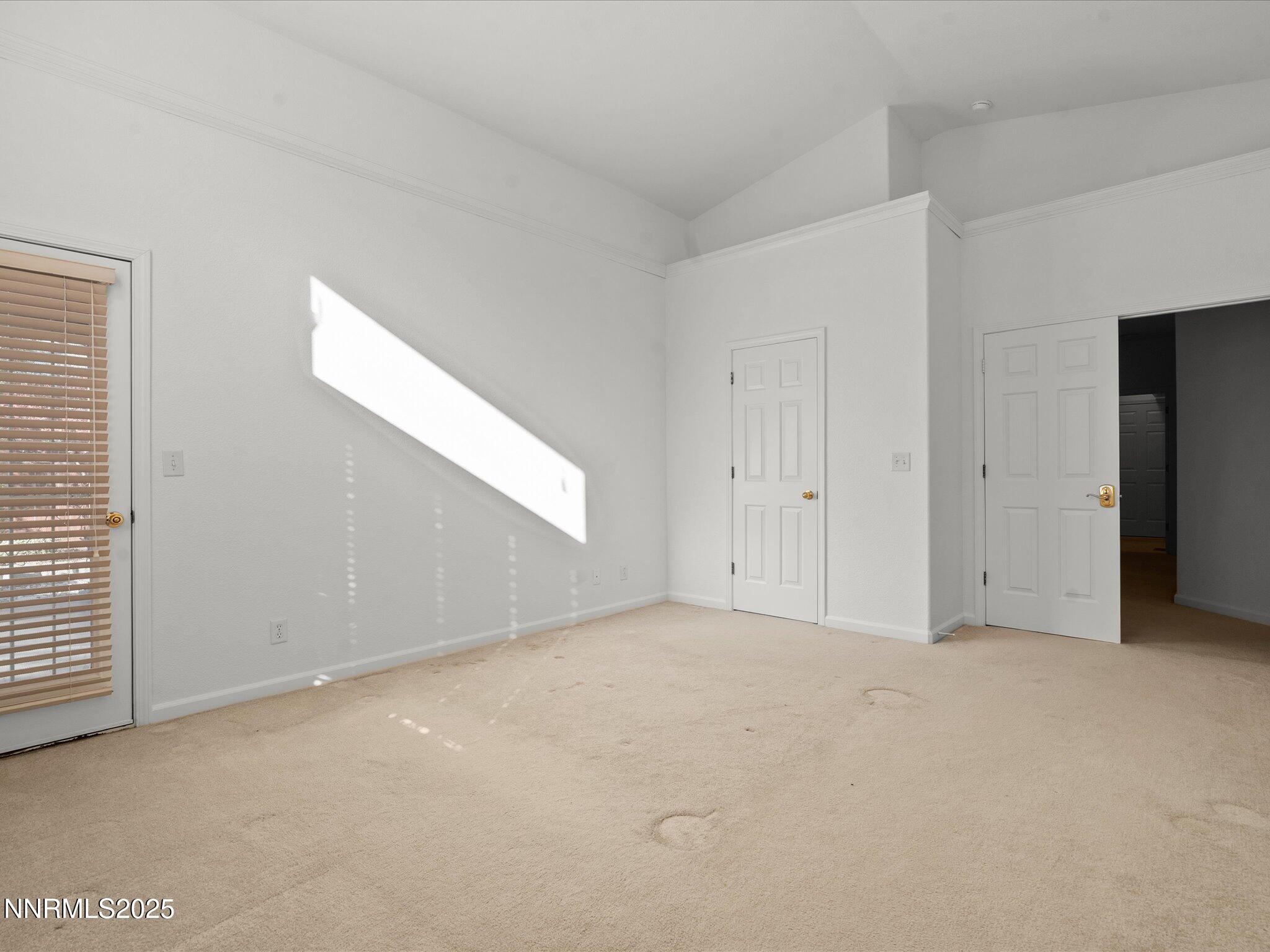 805 Sauvignon Drive Reno, NV 89506 - Photo 22 of 56 an empty room with windows