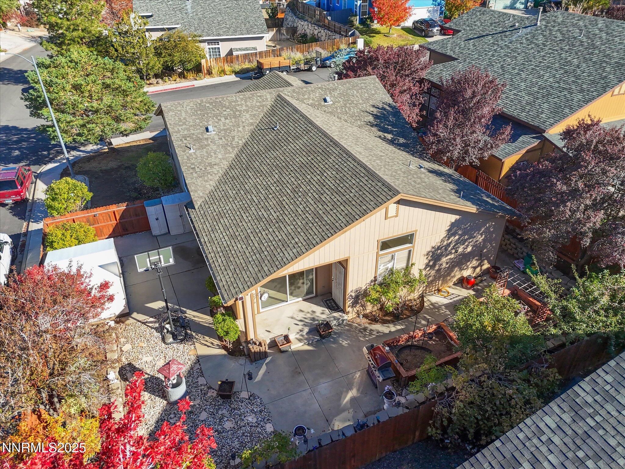 805 Sauvignon Drive Reno, NV 89506 - Photo 47 of 56 an aerial view of a house with a yard and a large tree