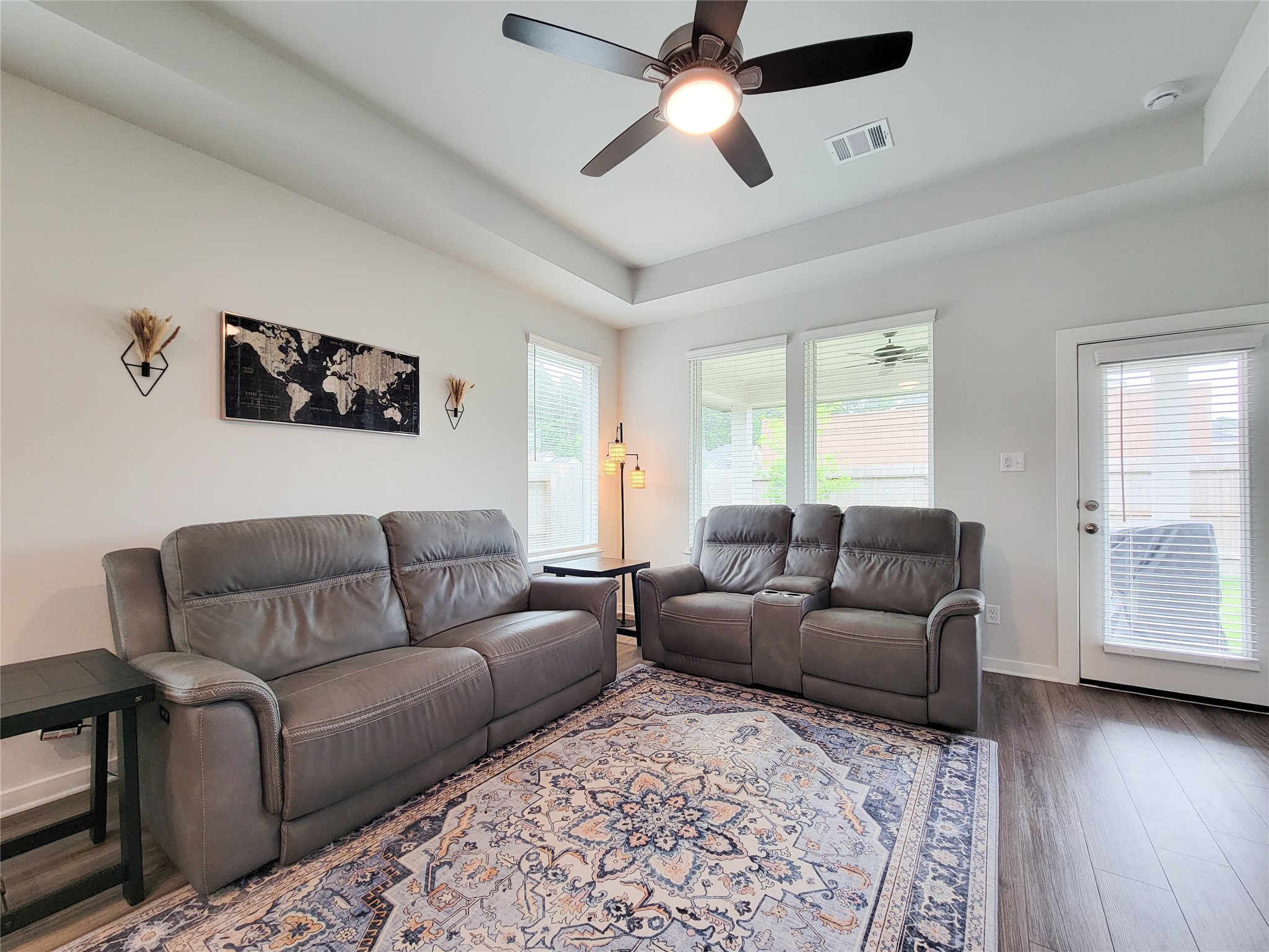 2818 Bluebonnet Ridge Drive Conroe, TX 77304 - Photo 19 of 42 a living room with furniture and a window