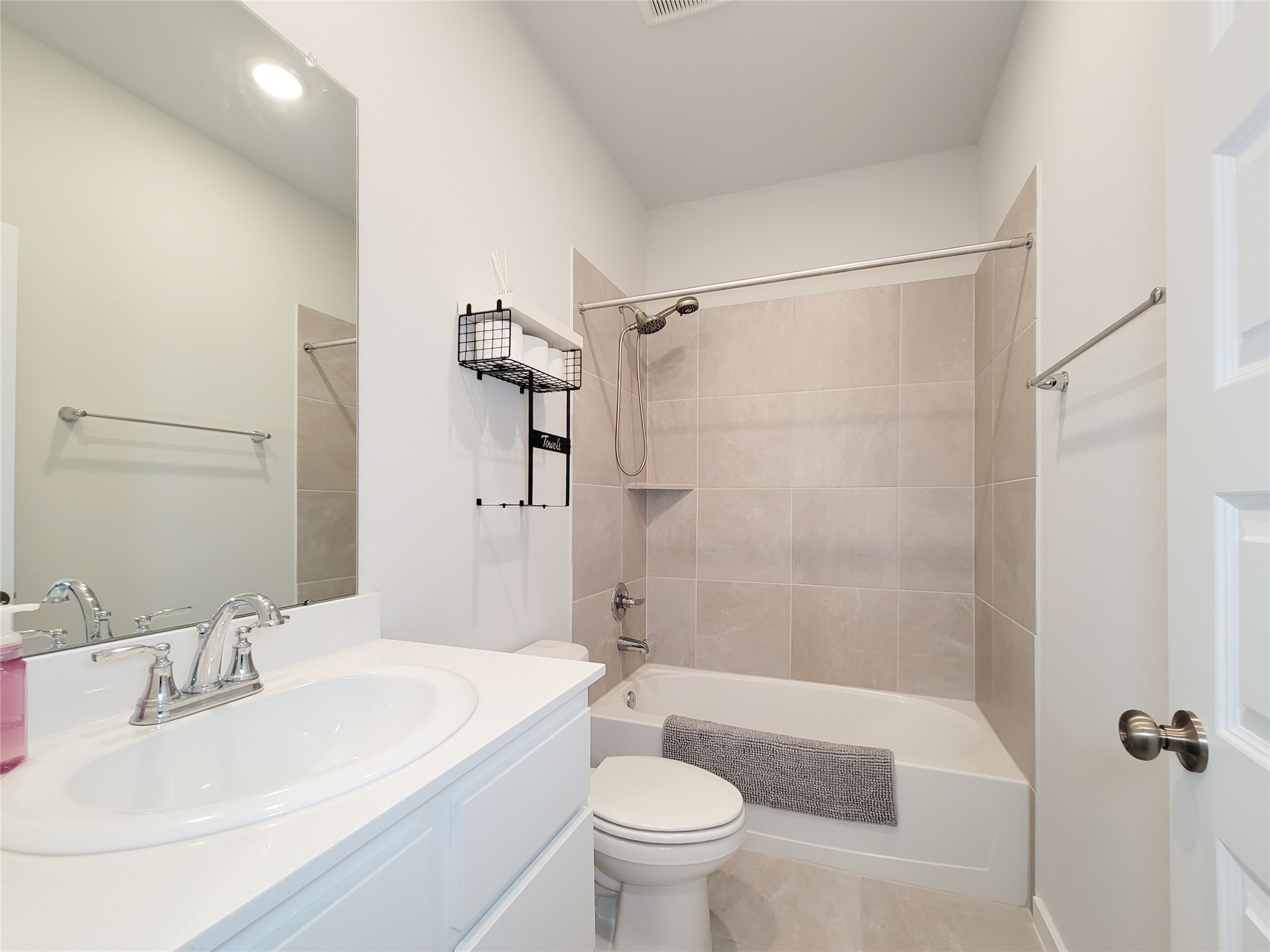 2818 Bluebonnet Ridge Drive Conroe, TX 77304 - Photo 31 of 42 a bathroom with a sink toilet and shower