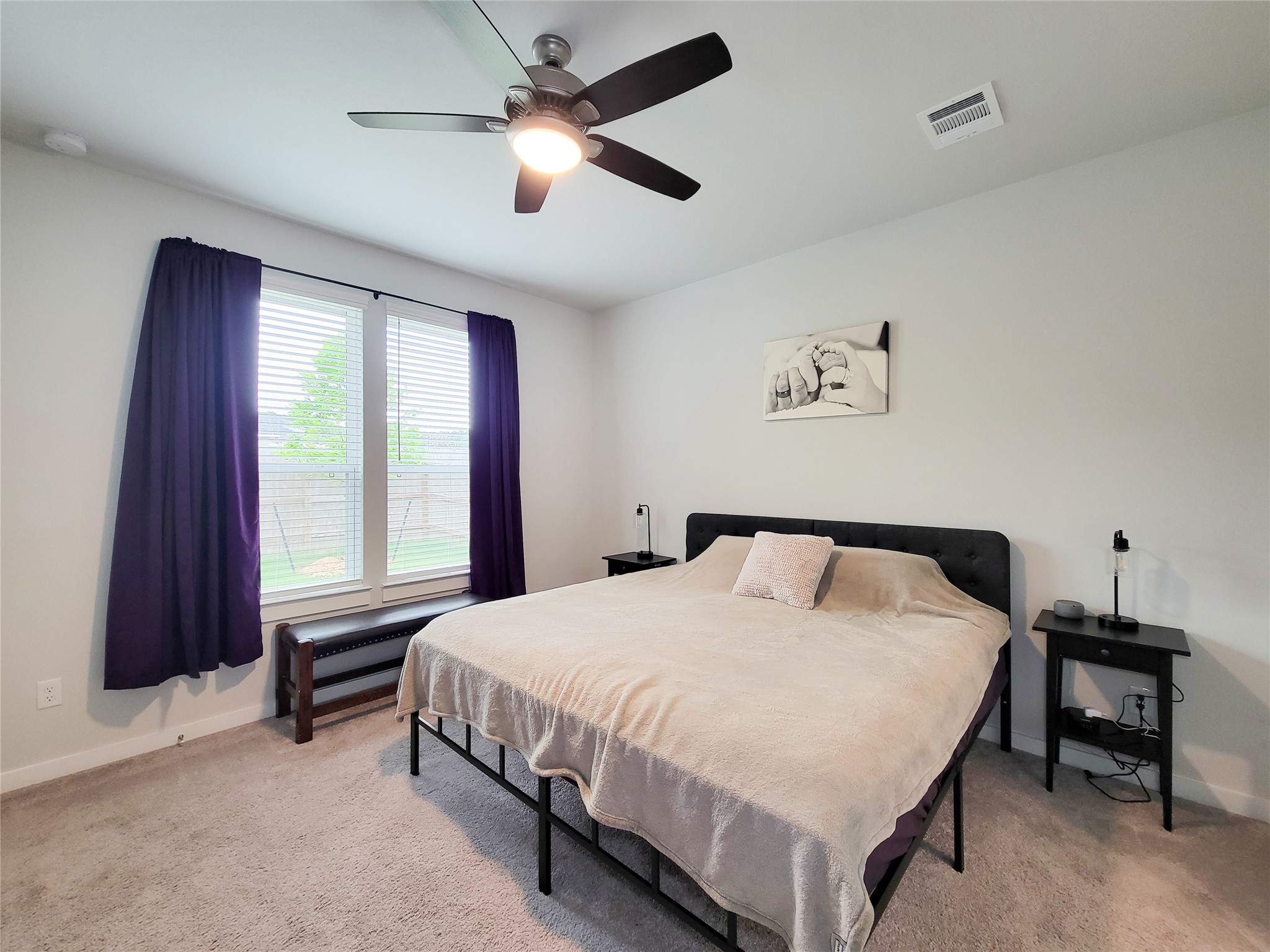 2818 Bluebonnet Ridge Drive Conroe, TX 77304 - Photo 4 of 42 a bedroom with a bed and a window