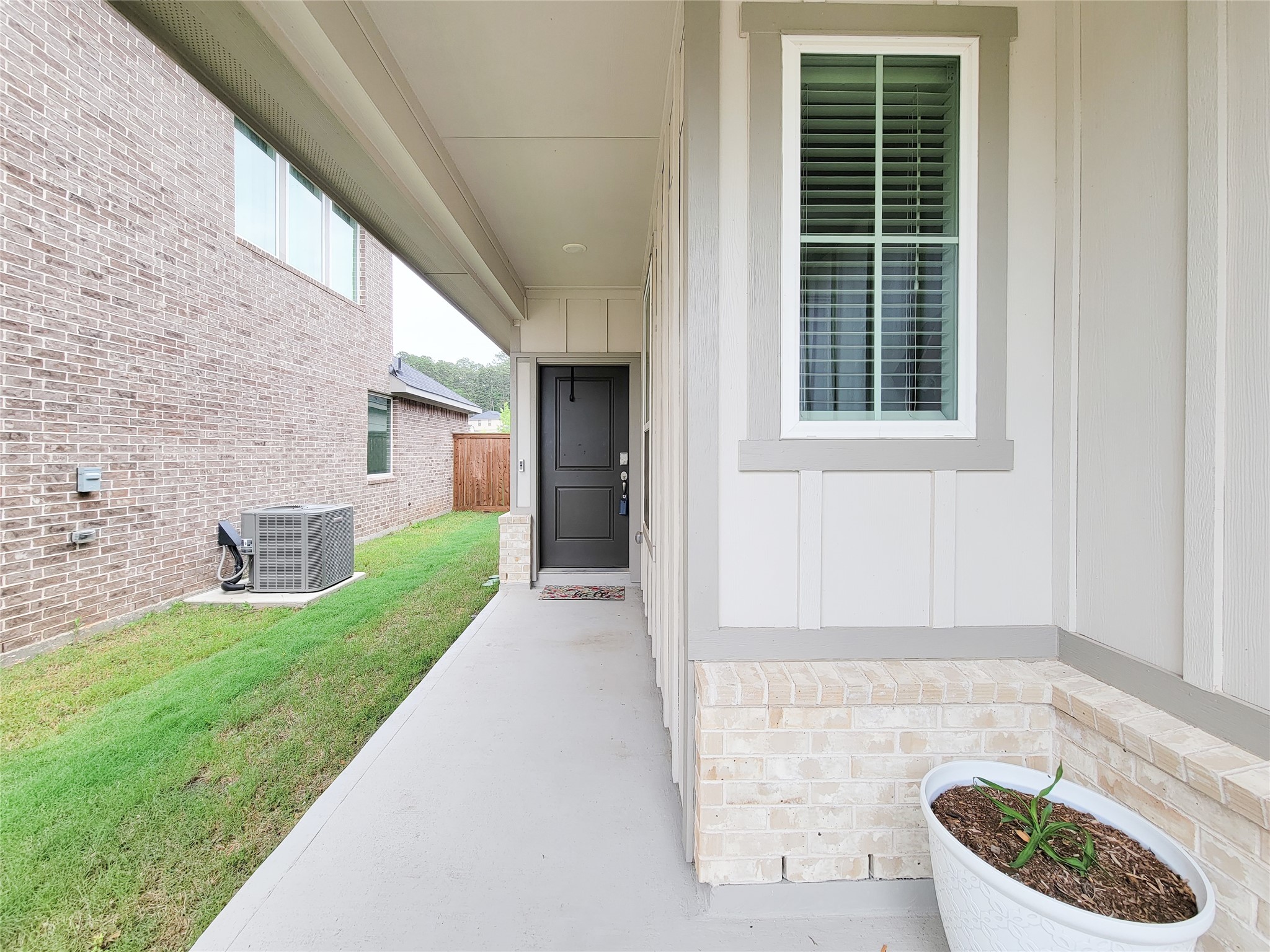 2818 Bluebonnet Ridge Drive Conroe, TX 77304 - Photo 7 of 42 a view of a house with a yard