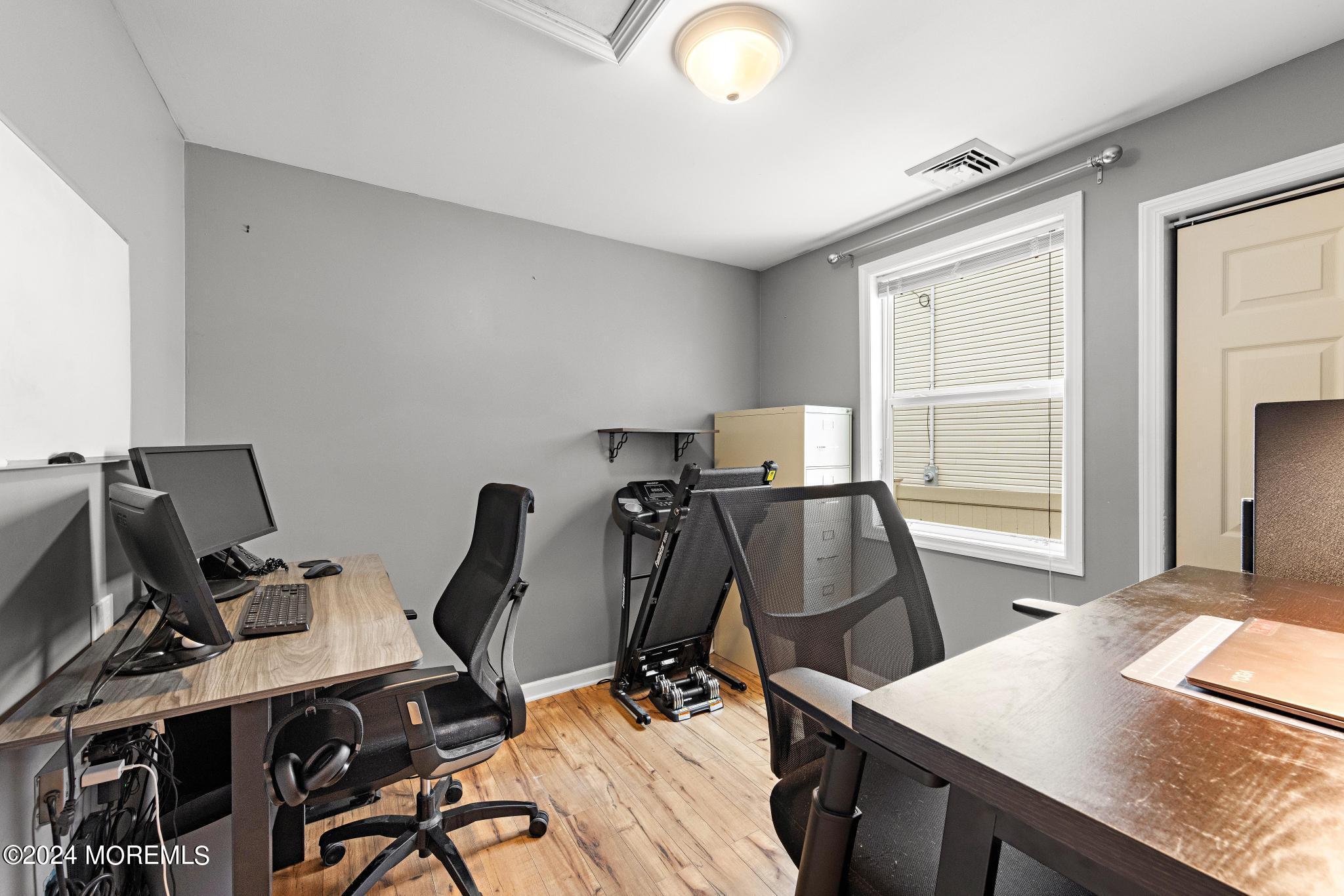 71 Highfield Avenue Matawan, NJ 07747 - Photo 16 of 24 a view of a workspace with furniture and a window
