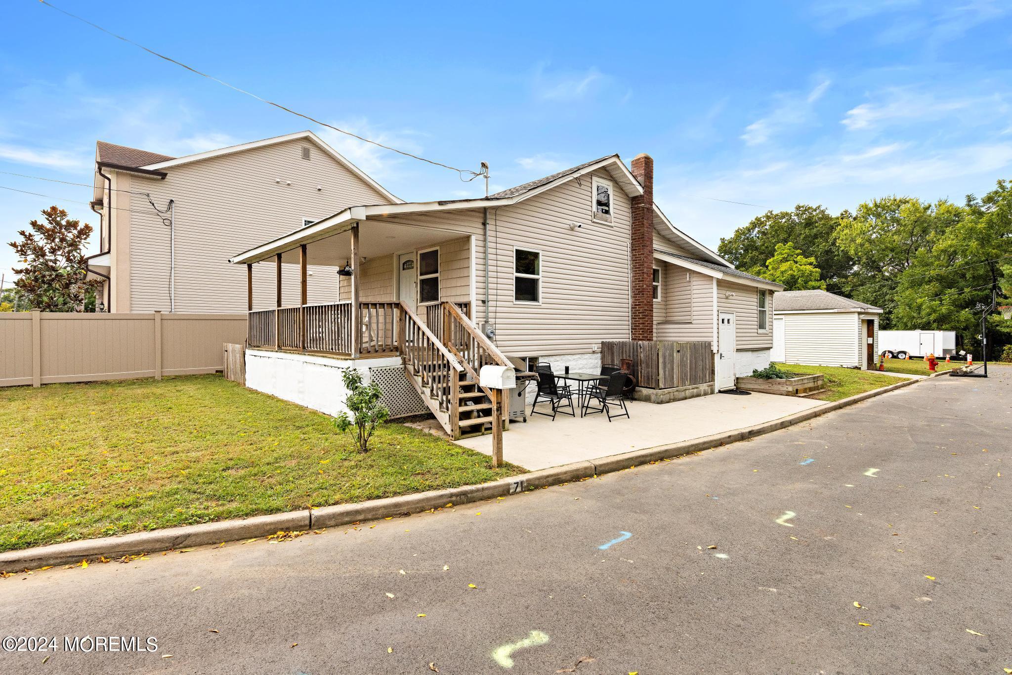 71 Highfield Avenue Matawan, NJ 07747 - Photo 2 of 24 a view of a house with patio