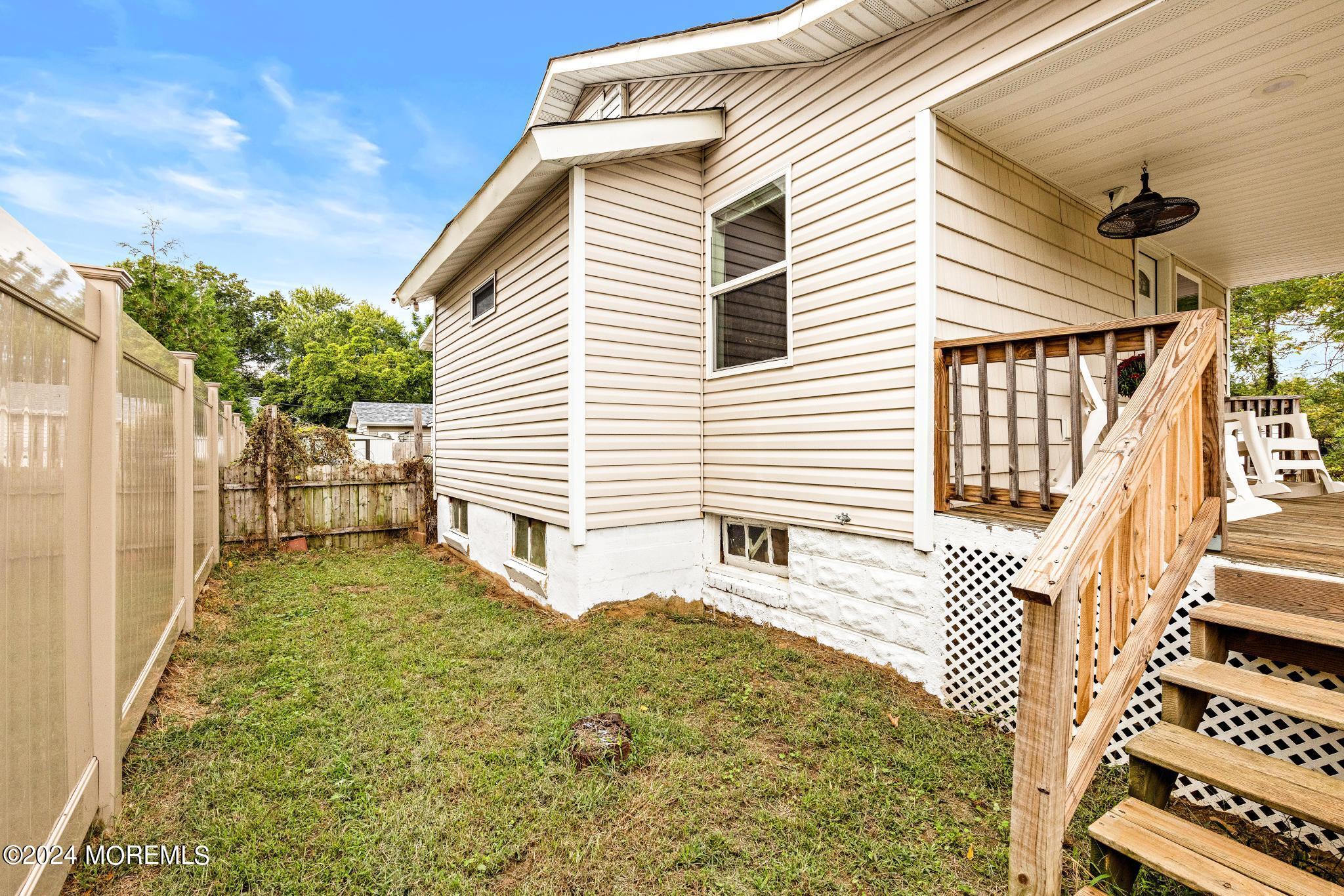 71 Highfield Avenue Matawan, NJ 07747 - Photo 24 of 24 a view of a house with a backyard