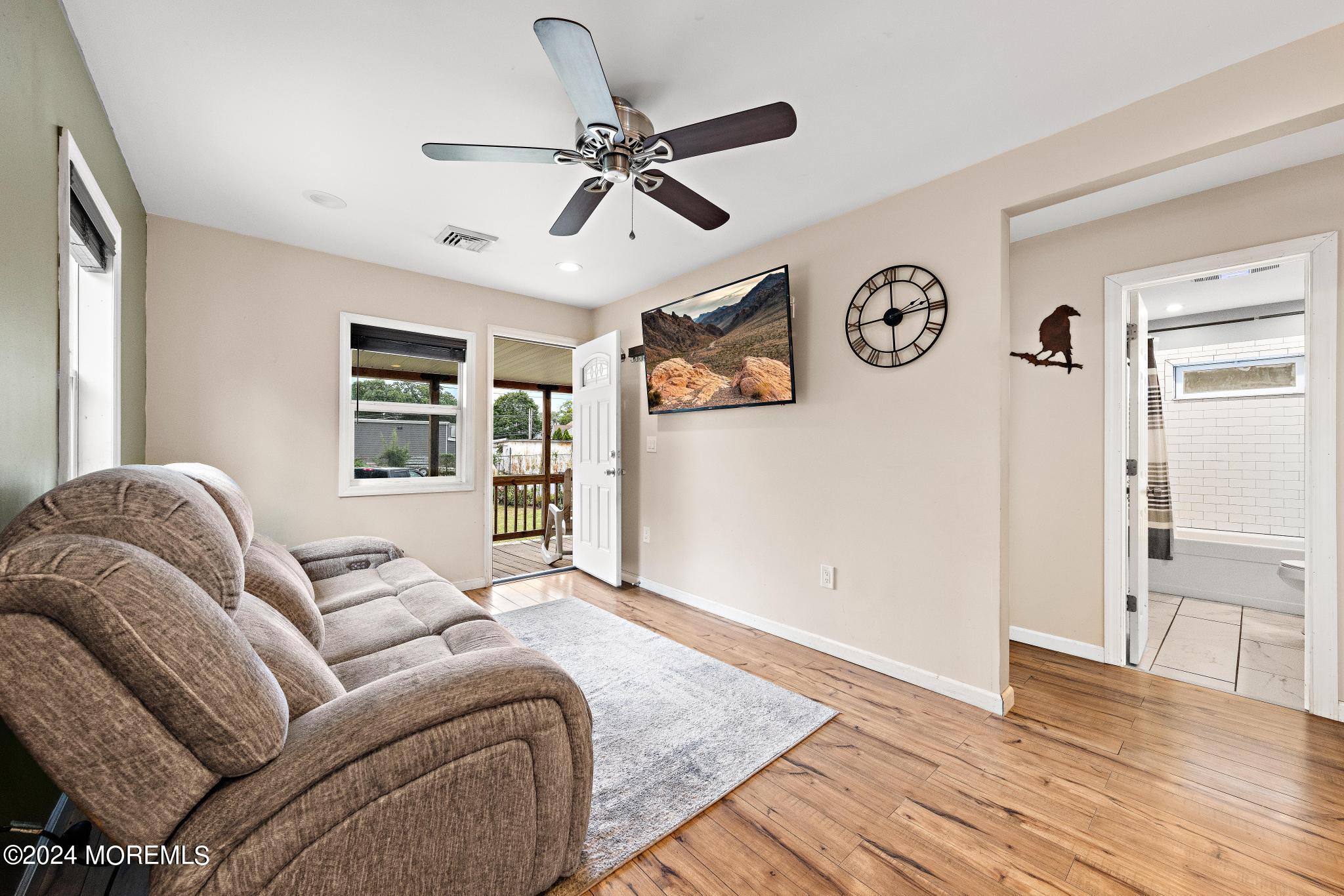 71 Highfield Avenue Matawan, NJ 07747 - Photo 6 of 24 a living room with furniture and a window