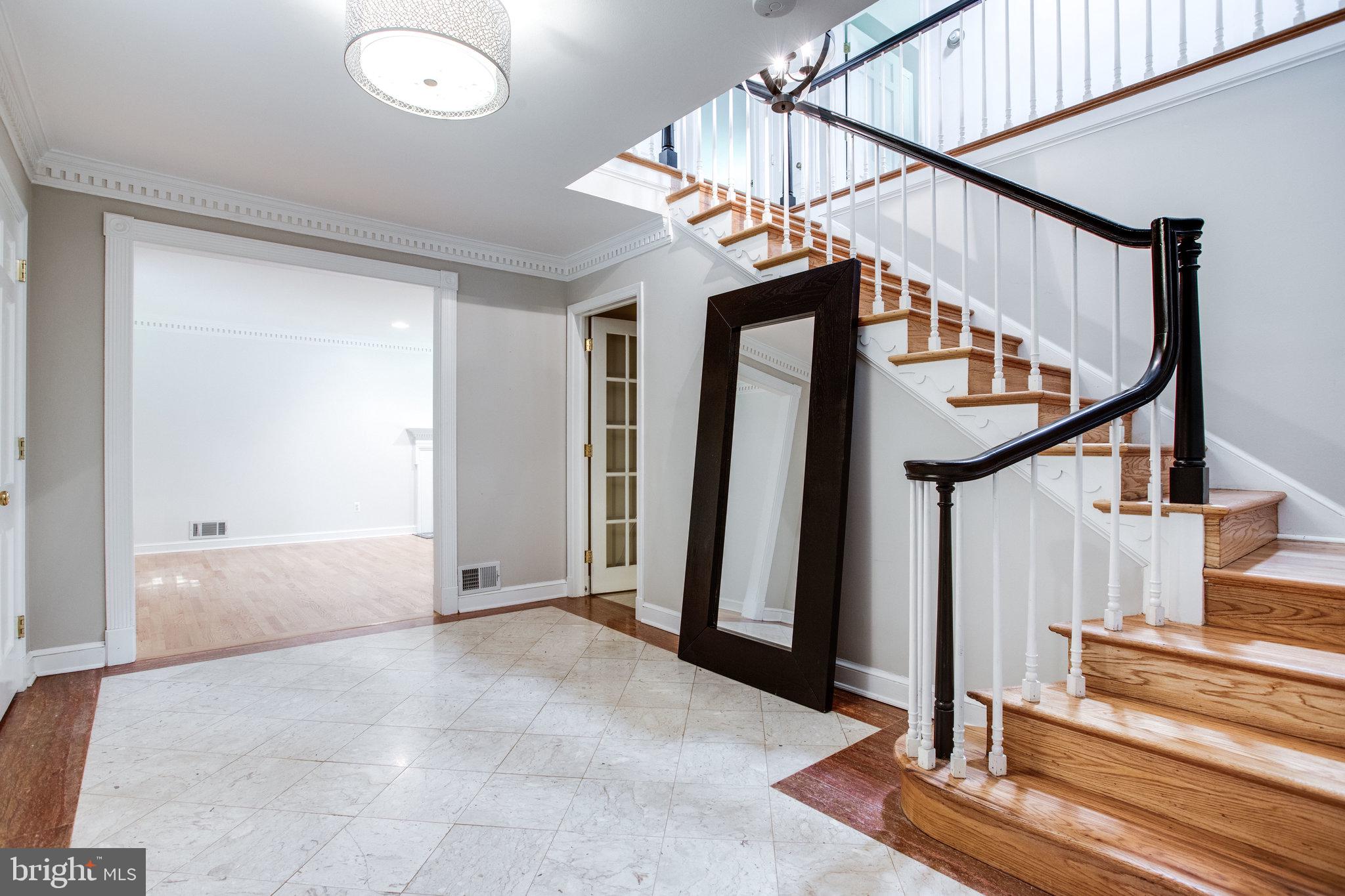 8500 Brook Road McLean, VA 22102 - Photo 3 of 44 a view of entryway and hall with wooden floor