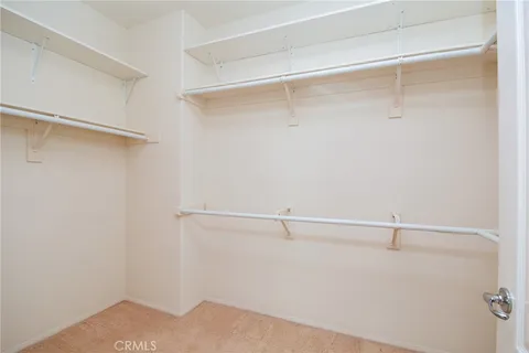 a view of empty room with windows