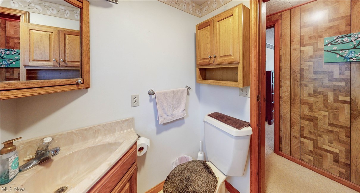 466 Pine Lake Road Sebring, OH 44672 - Photo 28 of 30 Bathroom featuring vanity and toilet