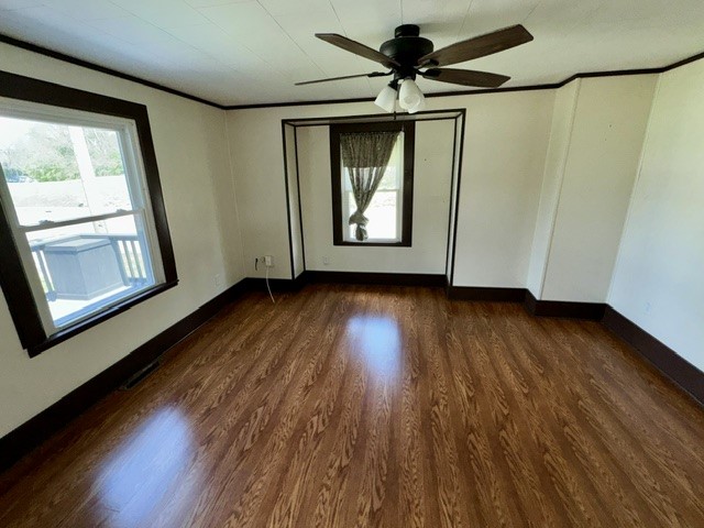 1701 West Jefferson Street Springfield, OH 45506 - Photo 8 of 18 This versatile room boasts durable flooring and ample natural light, ideal for comfortable living.