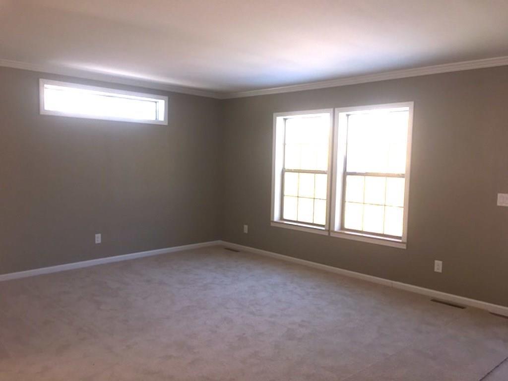 49 Dr Mann Road Chelsea, ME 04330 - Photo 12 of 22 Large living room off of the...
