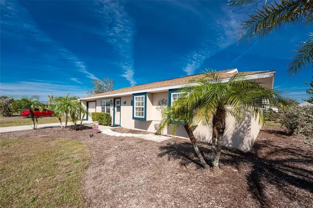 a view of a swimming pool with a lounge chairs