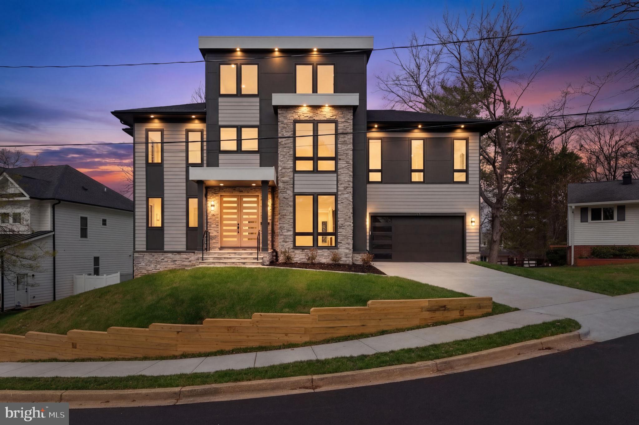 505 Adelman Circle Southwest Vienna, VA 22180 - Photo 2 of 85 a front view of a house with a yard