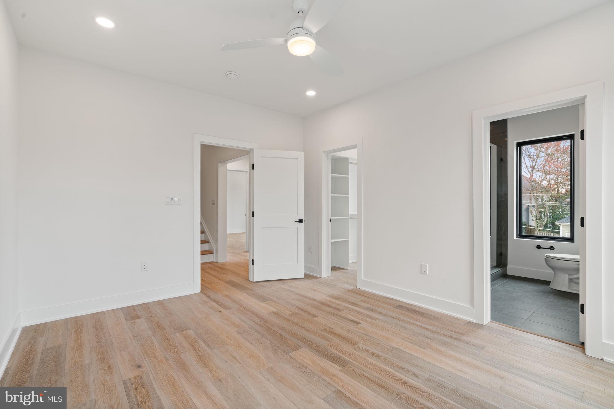 505 Adelman Circle Southwest Vienna, VA 22180 - Photo 49 of 85 wooden floor in an empty room with a window