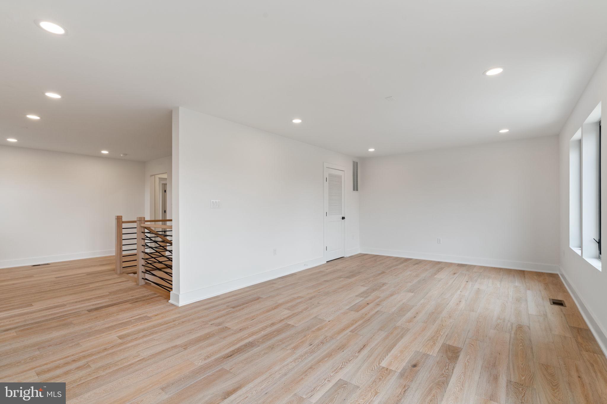 505 Adelman Circle Southwest Vienna, VA 22180 - Photo 60 of 85 a view of empty room with wooden floor and window