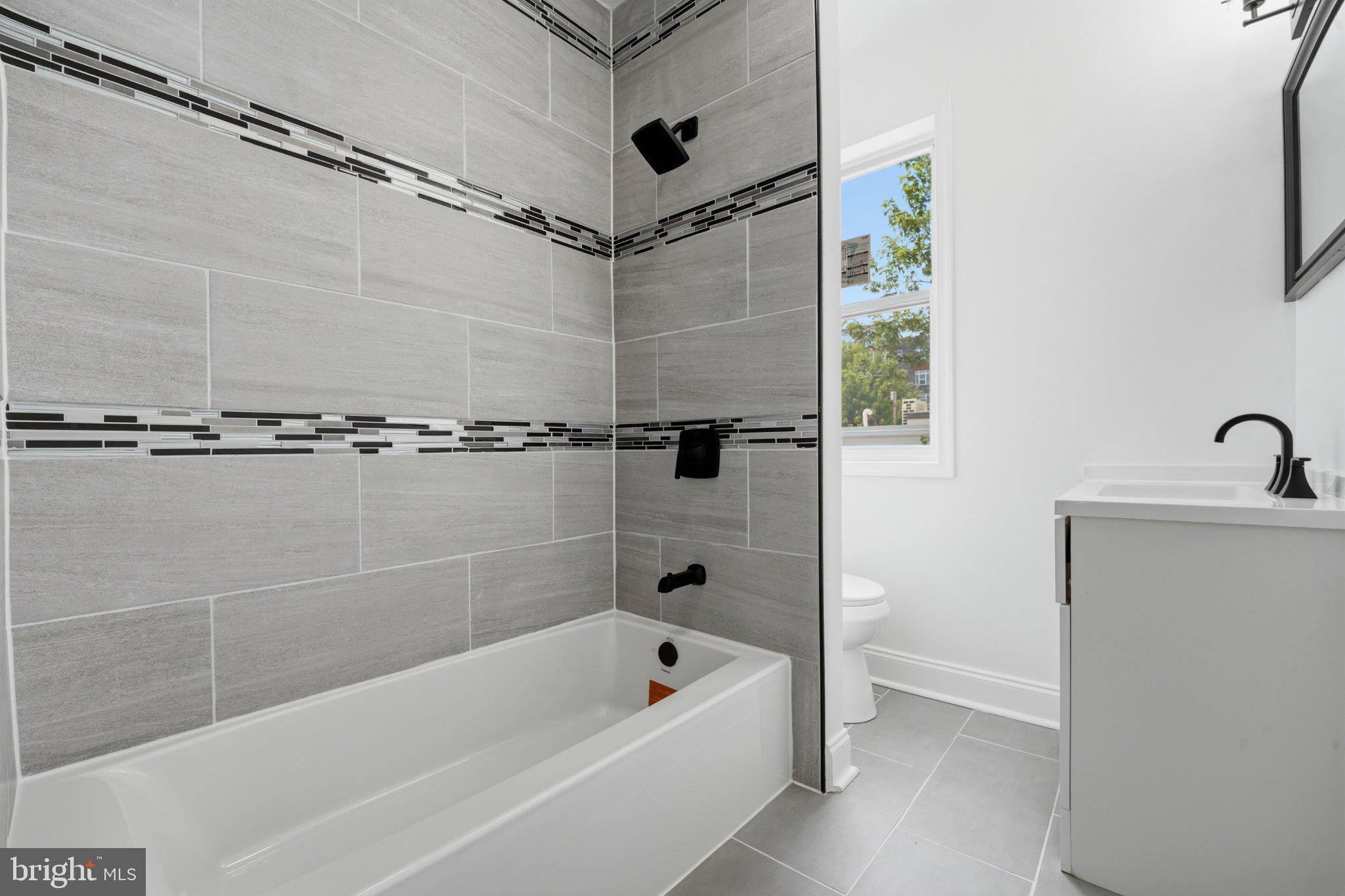914 5th Street Northeast Washington, DC 20002 - Photo 21 of 36 Modern bathroom with sleek finishes.