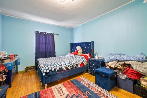 a bedroom with a bed and a closet