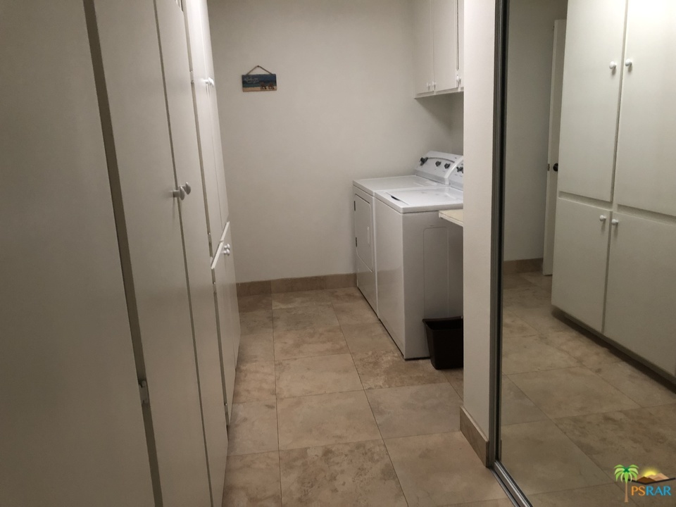 81 La Ronda Drive Rancho Mirage, CA 92270 - Photo 23 of 30 Laundry Room with Storage