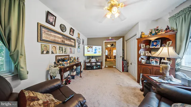 a bedroom with furniture and a gym equipment
