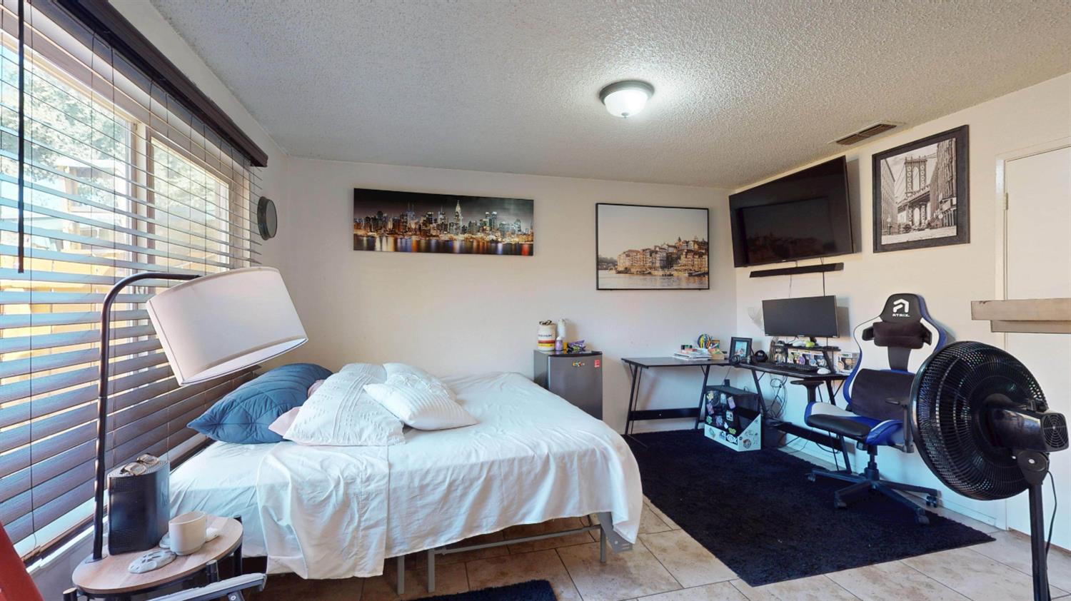 4005 Honey Creek Road Modesto, CA 95356 - Photo 20 of 25 a bedroom with furniture and a large window