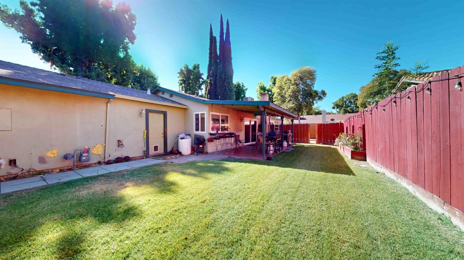 4005 Honey Creek Road Modesto, CA 95356 - Photo 23 of 25 a view of a house with backyard swimming pool and sitting area