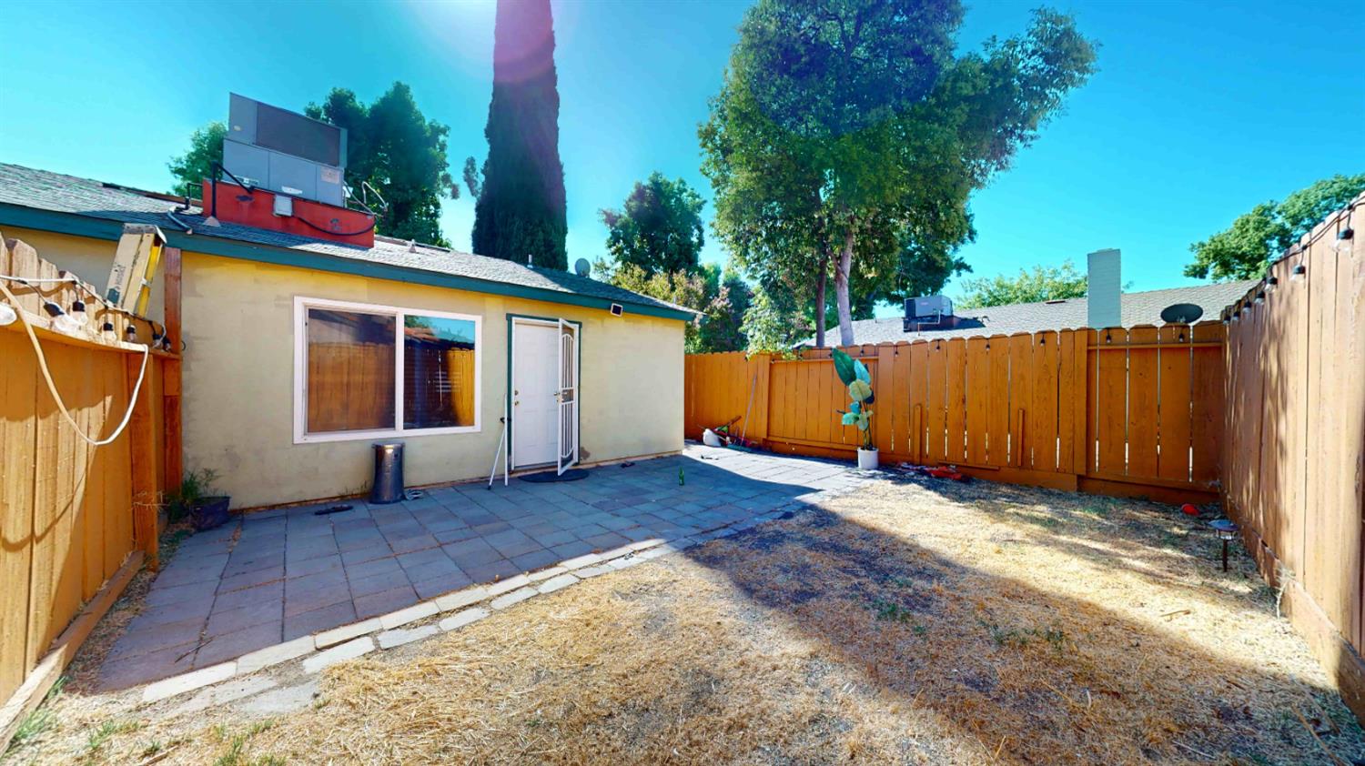 4005 Honey Creek Road Modesto, CA 95356 - Photo 24 of 25 a view of a house with a backyard and a tub