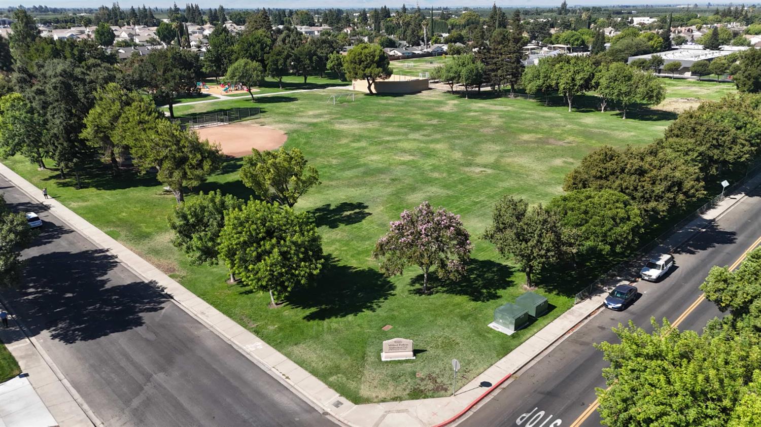 4005 Honey Creek Road Modesto, CA 95356 - Photo 25 of 25 a view of a garden with a bench