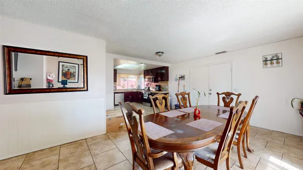 a view of a dining room kitchen and a livingroom