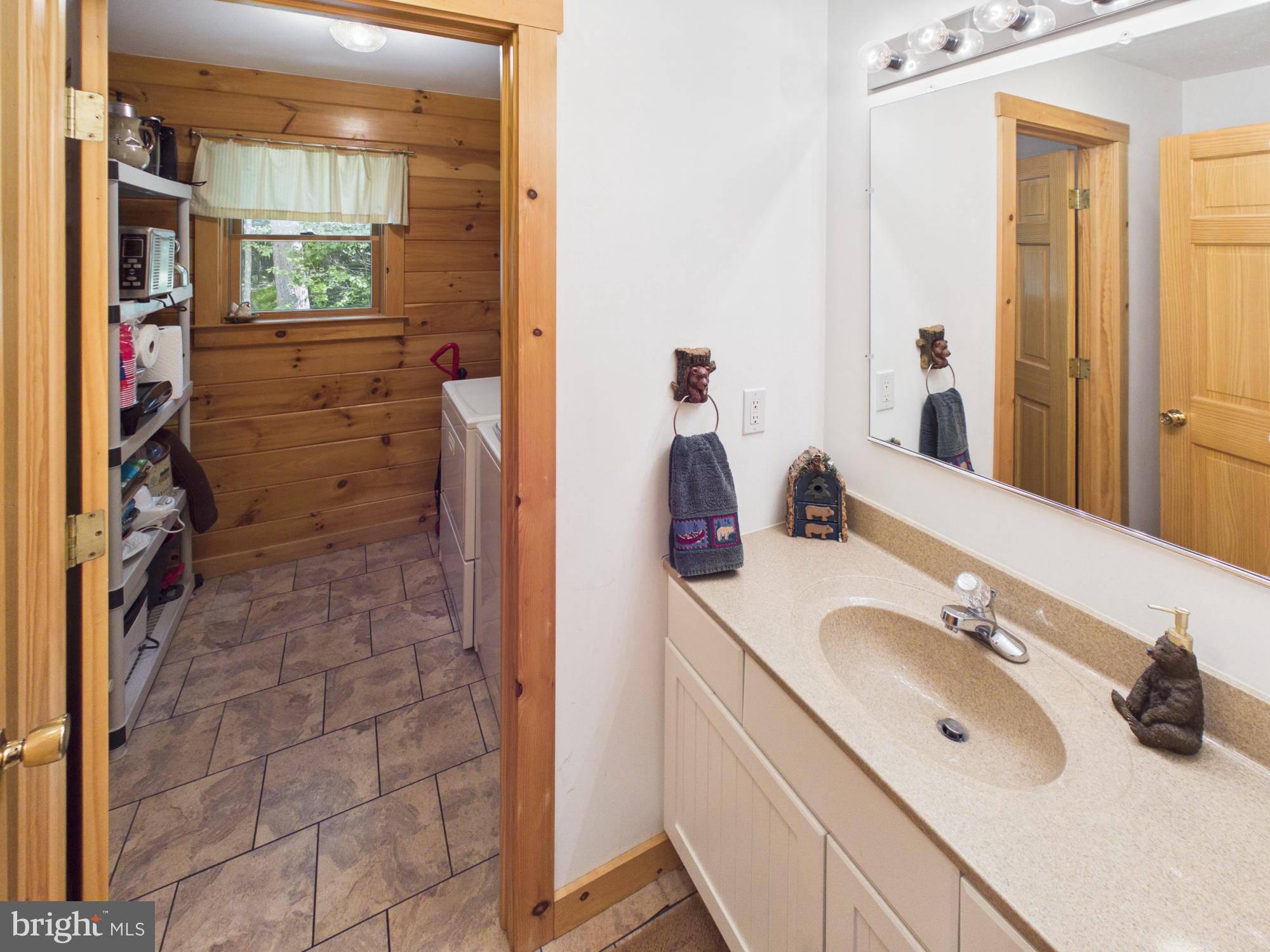 477 Finn Swamp Road Lakeville, PA 18438 - Photo 37 of 53 Powder room/laundry room/pantry