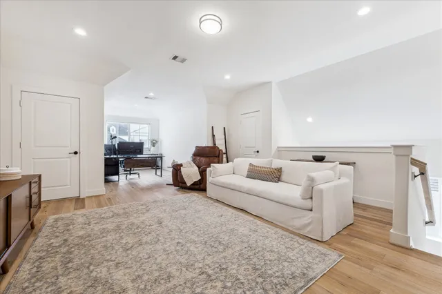 a living room with furniture and a couch