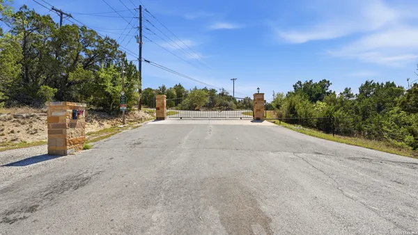 a view of a road with a yard