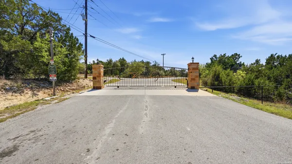 a view of a road with a building in the background