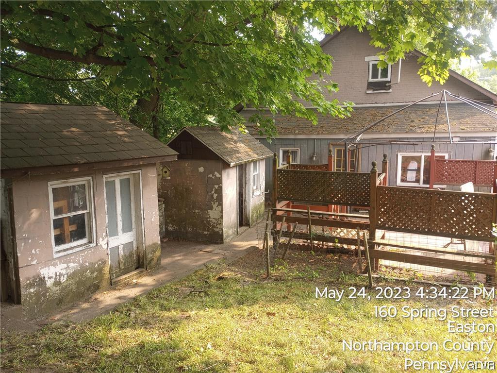 160 Spring Street Easton, PA 18042 - Photo 11 of 35 a view of a house with backyard and sitting area