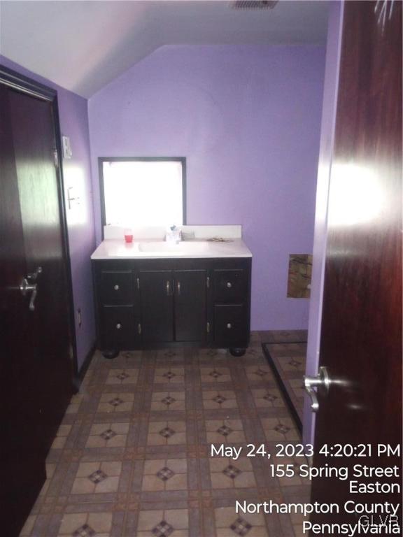 160 Spring Street Easton, PA 18042 - Photo 19 of 35 a bathroom with a sink and a mirror