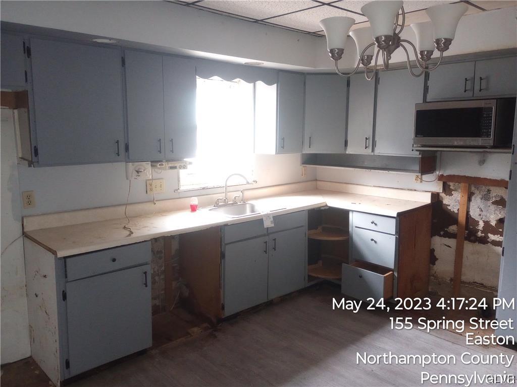 160 Spring Street Easton, PA 18042 - Photo 23 of 35 a kitchen with a sink appliances and cabinets
