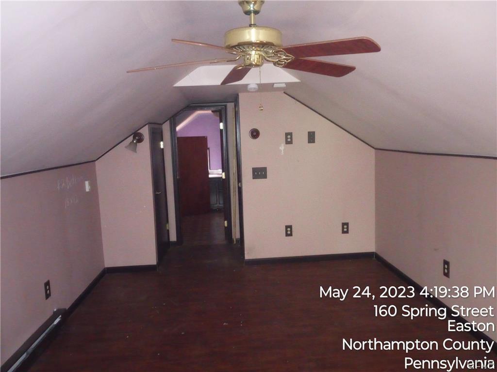 160 Spring Street Easton, PA 18042 - Photo 27 of 35 a view of a hallway with a chandelier