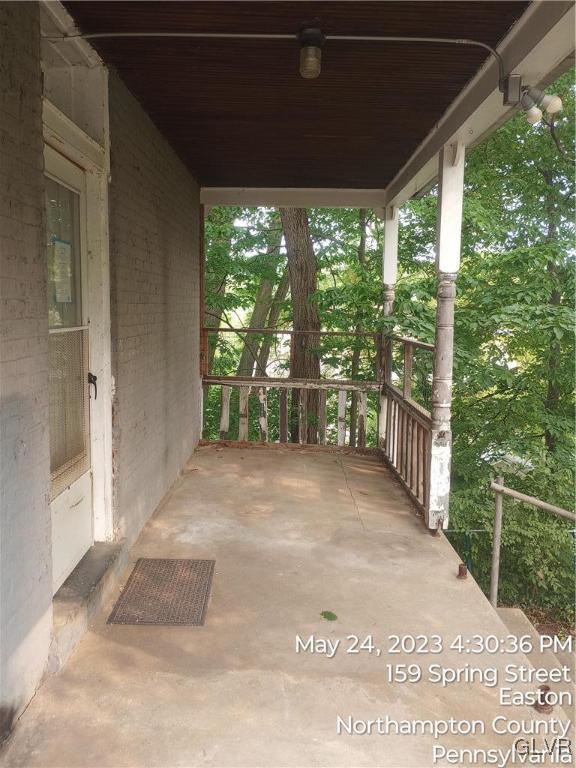 160 Spring Street Easton, PA 18042 - Photo 6 of 35 a view of a porch with wooden floor and windows