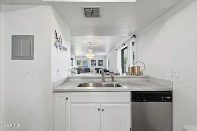 a view of a sink and mirror