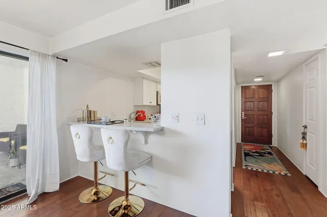 a view of kitchen with dining area