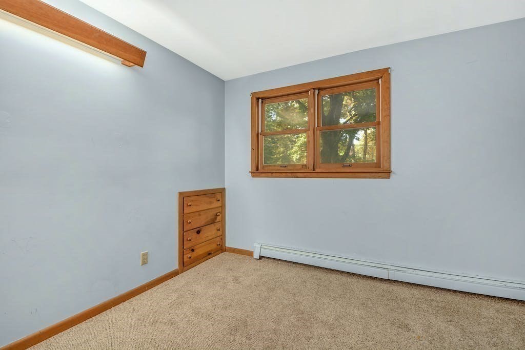 30 Old Marlboro Road Maynard, MA 01754 - Photo 19 of 34 an empty room with a window