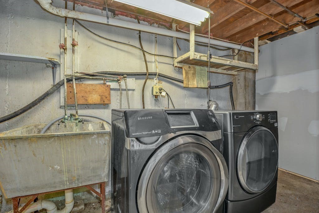 30 Old Marlboro Road Maynard, MA 01754 - Photo 24 of 34 a utility room with dryer and washer
