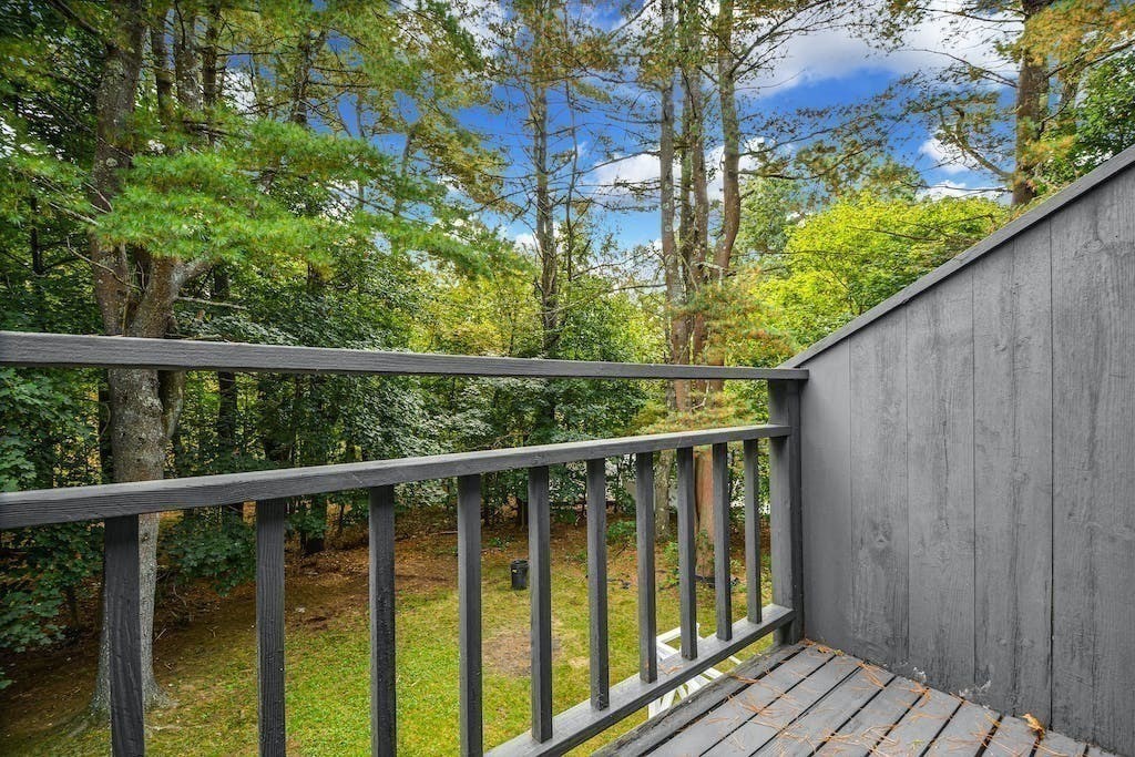 30 Old Marlboro Road Maynard, MA 01754 - Photo 25 of 34 a view of a balcony with wooden floor