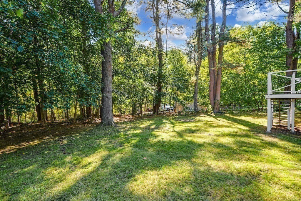 30 Old Marlboro Road Maynard, MA 01754 - Photo 27 of 34 a view of backyard with green space