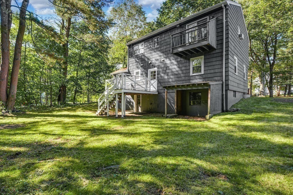 30 Old Marlboro Road Maynard, MA 01754 - Photo 28 of 34 a view of a house with a yard