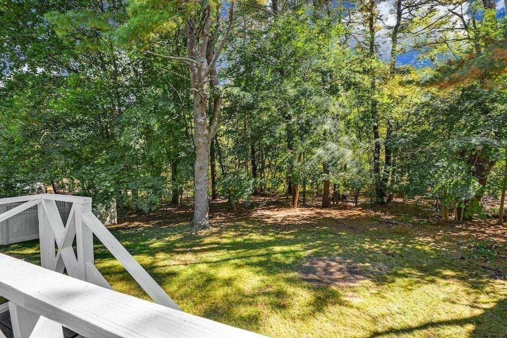 30 Old Marlboro Road Maynard, MA 01754 - Photo 31 of 34 a view of a swimming pool with a patio