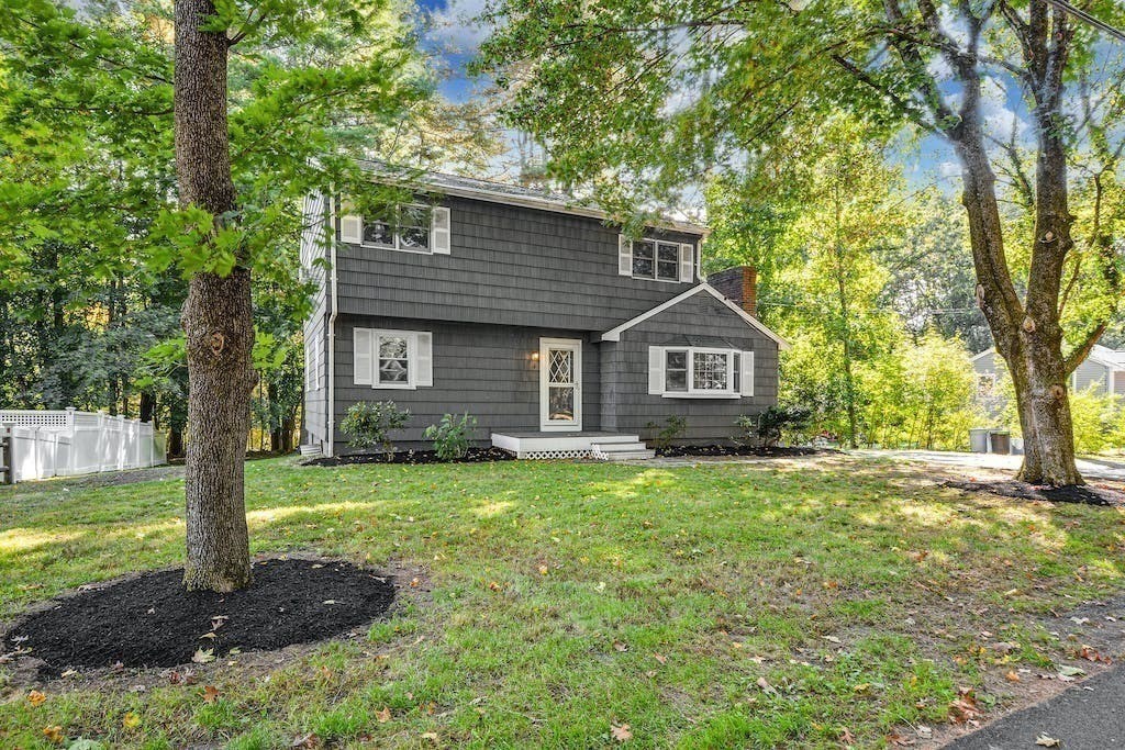 30 Old Marlboro Road Maynard, MA 01754 - Photo 33 of 34 a front view of a house with yard and tree