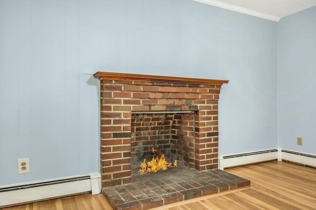 30 Old Marlboro Road Maynard, MA 01754 - Photo 7 of 34 a view of empty room with wooden floor