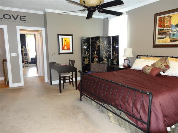 34 Draper Woods Road Sturbridge, MA 01518 - Photo 12 of 27 a spacious bedroom with a bed and furniture