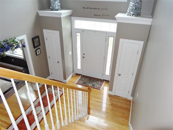 34 Draper Woods Road Sturbridge, MA 01518 - Photo 22 of 27 a view of front door with wooden floor