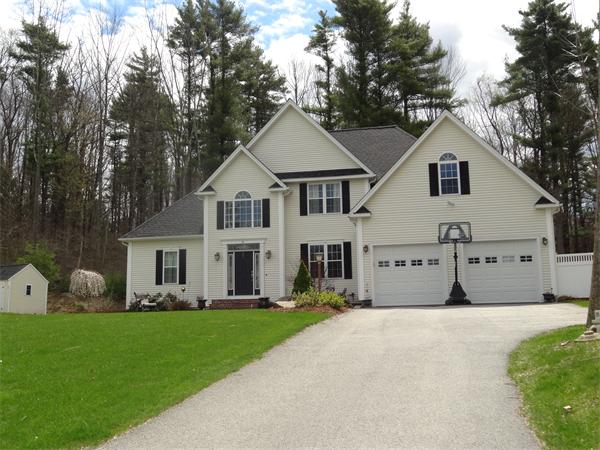 34 Draper Woods Road Sturbridge, MA 01518 - Photo 27 of 27 a front view of a house with garden